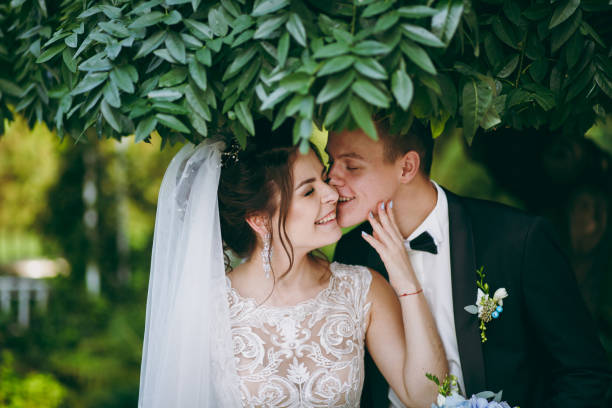 istock Beautiful wedding couple on a walk outdoor 854094226