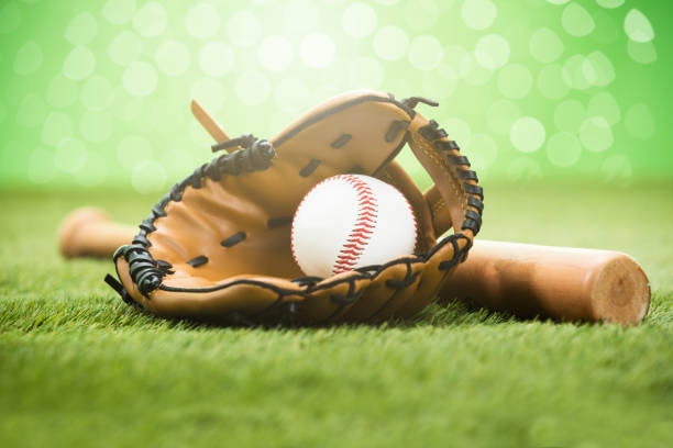 istock Hockey Equipment On Grassy Field 854098364
