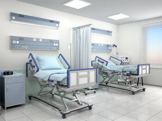 istock hospital room with two beds in blue tones 854102990