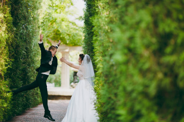 istock Beautiful wedding couple on a walk outdoor 854103724
