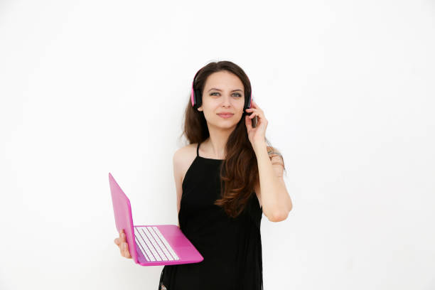 istock Girl dancing in headphones on a white background 854110144