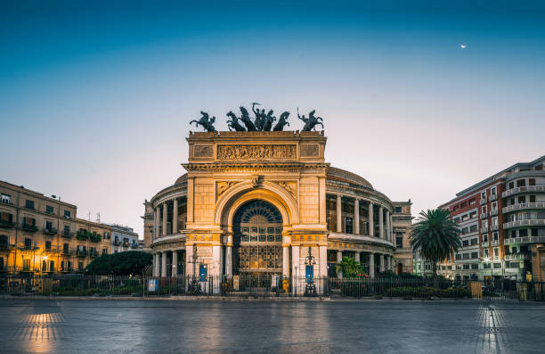 Politeama theater in Palermo, Italy The morning view of the Politeama Garibaldi theater in Palermo, Sicily, Italy palermo sicily stock pictures, royalty-free photos & images