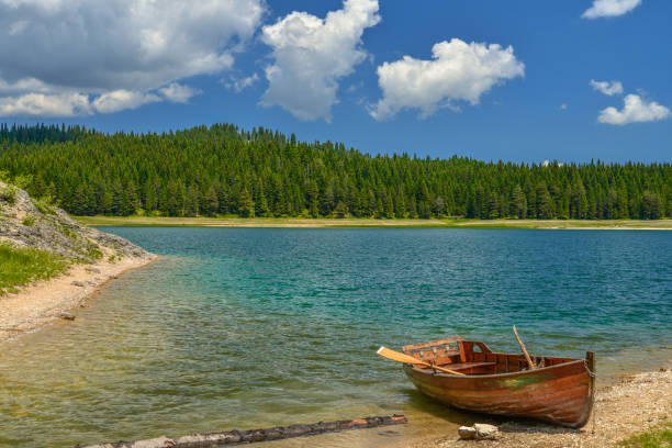 istock Boat on the coast of Black Lake 854119578
