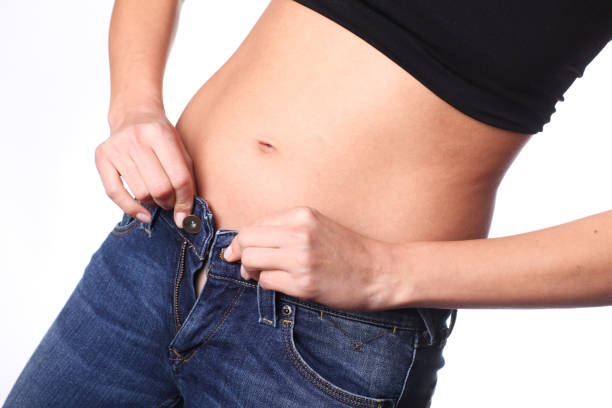 istock Too many calories. Belly is growing. 854125594