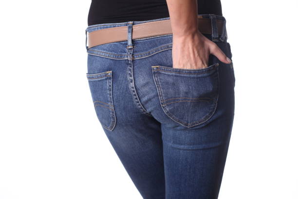 istock Woman in jeans is having an intimate problem. 854125752