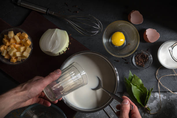 istock Sauteed basil with base sauce, cheese, milk for mornay sauce 854134816