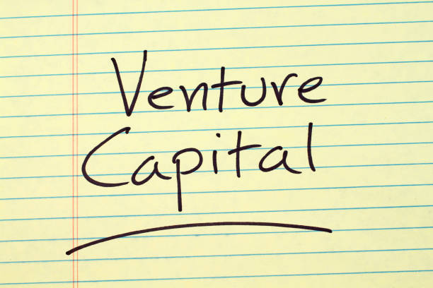 venture capital su un cuscinetto legale giallo - note pad legal system yellow paper foto e immagini stock