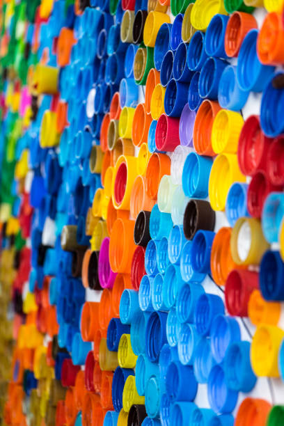 istock Background of bright colored plastic plugs side view 854143360