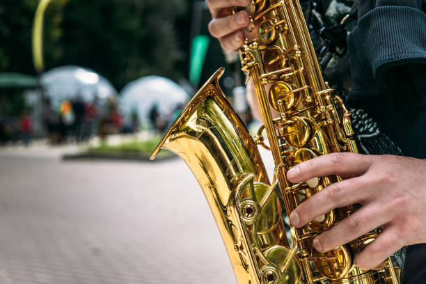 istock Hands of saxophone player close-up 854151430