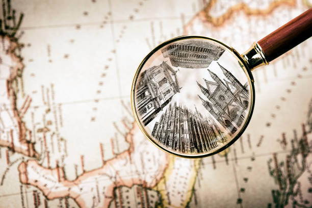 A magnifying glass focusing on California on a map