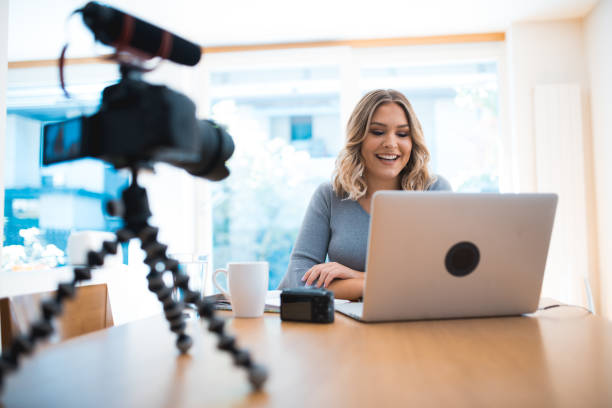 istock Woman vlogging herself at home 854156518