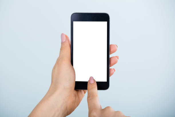 istock Woman Hand Holding Mobilephone 854179234
