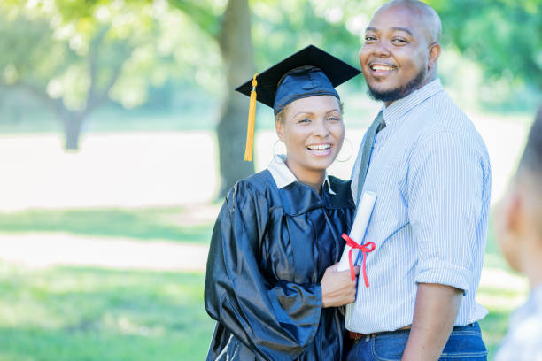 istock Happy woman receives master's degree 854184858