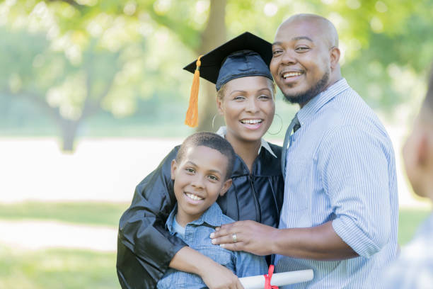 istock Proud family with college graduate 854184880