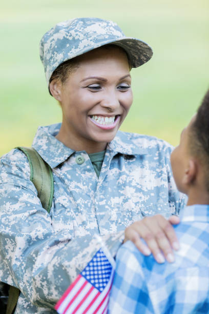 istock African American mom is reunited with her son after deployment 854184990