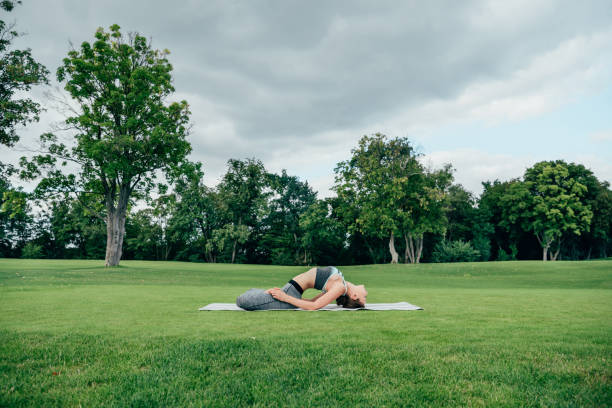 istock woman performing lotus pose 854190922