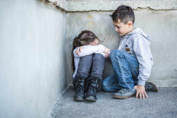 istock six years old sad school at the schoolyards 854202782