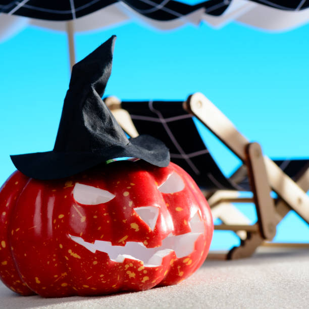 istock Pumpkin and deck chair with umbrella 854205470