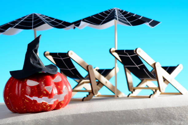 Pumpkin and deck chair with umbrella