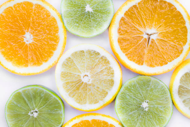Grapefruit, orange, lemon and lime on white background