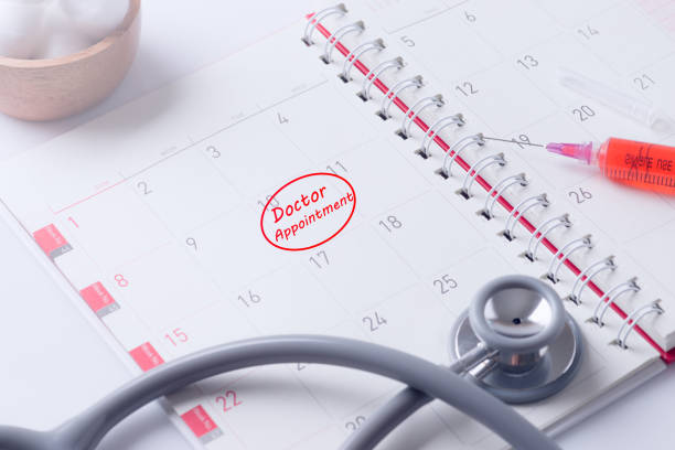 istock Doctor appointment on paper of organizer 854220096