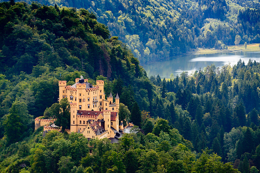High angle view of Schloss Hohenschwangau, ancestral home to Bavaria’s King Ludwig II, builder of some of Germany’s most famous castles.