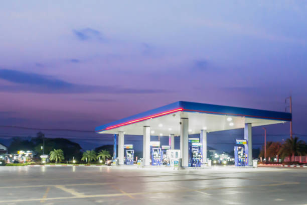istock blur gas station with clouds and sky at sunset for background 854229790