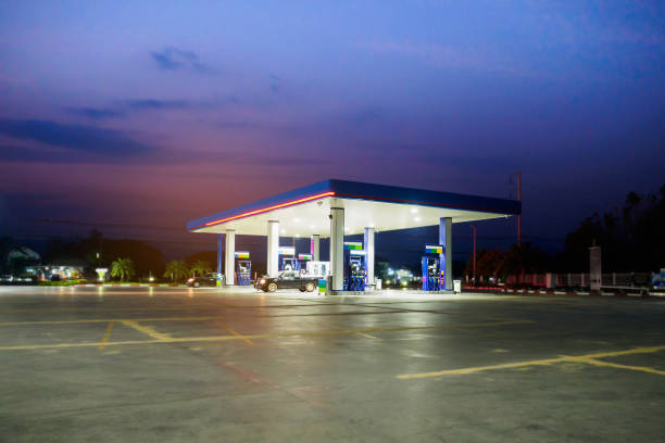 istock gas station with clouds and sky at sunset 854229792