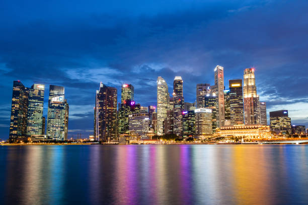 istock Singapore Skyline at Marina Bay During Sunset Blue Hour 854230928