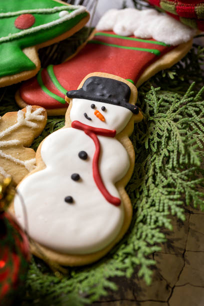 istock Christmas cookies on wooden table 854238016