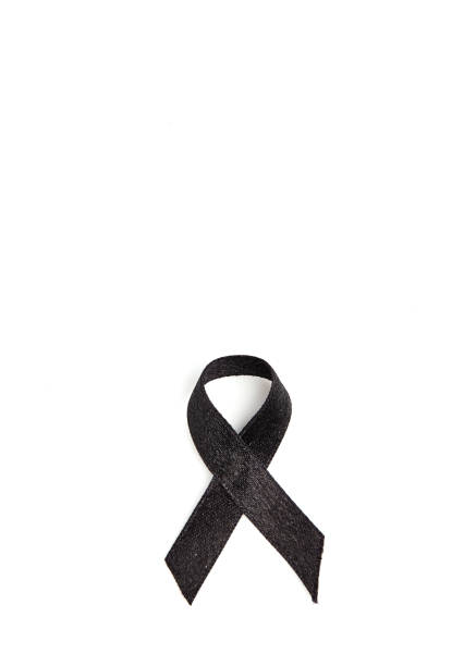 istock Black ribbon isolated on white 854244112