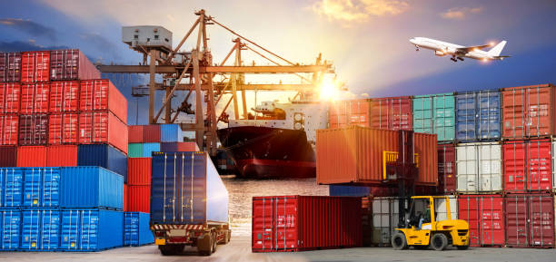 istock Logistics and transportation of Container Cargo ship and Cargo plane with working crane bridge in shipyard 854254112