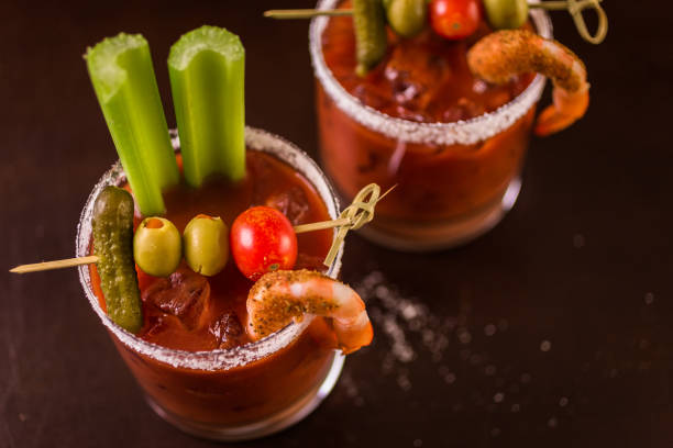 istock Bloody mary cocktail garnished with celery sticks and olives. 854257414