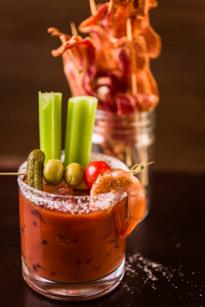 istock Bloody mary cocktail garnished with celery sticks and olives. 854257422