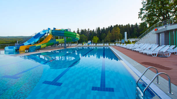 istock swimming pool in beautiful park 854276400