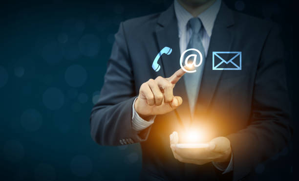 istock Businessman touch email icon on hand, communication concept 854276878