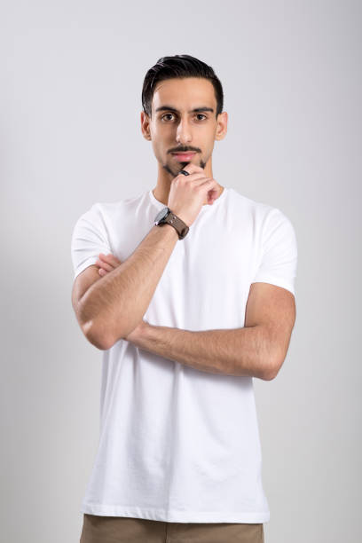 istock Young Man in White Shirt and Khaki Pants Over White Background 854300752