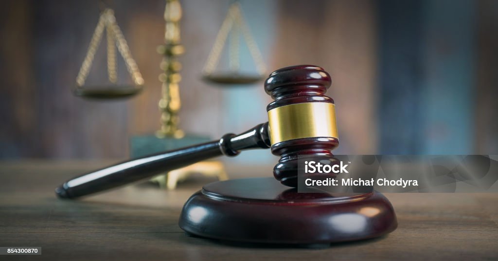Law and Justice concept. Mallet of the judge, books, scales of justice.  Courtroom theme. Law and Justice concept. Mallet of the judge, books, scales of justice. Gavel Stock Photo