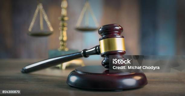 Law And Justice Concept Mallet Of The Judge Books Scales Of Justice Courtroom Theme Stock Photo - Download Image Now