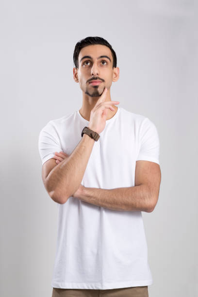istock Guy in White Shirt and Khaki Pants Over White Background 854300886