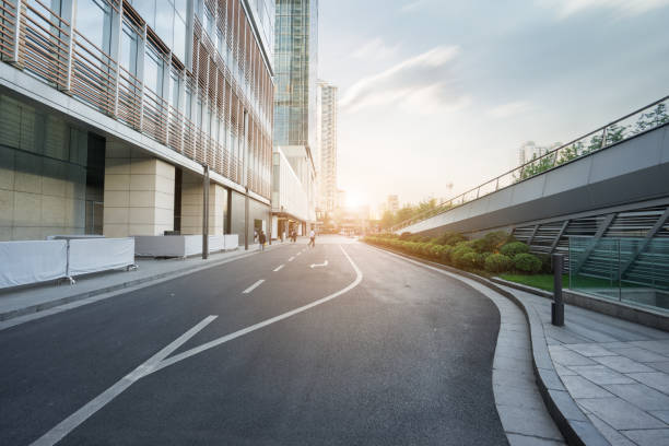 istock modern city road and building 854303926