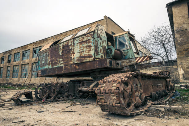 istock Abandoned excavator on old abandoned plant 854304048