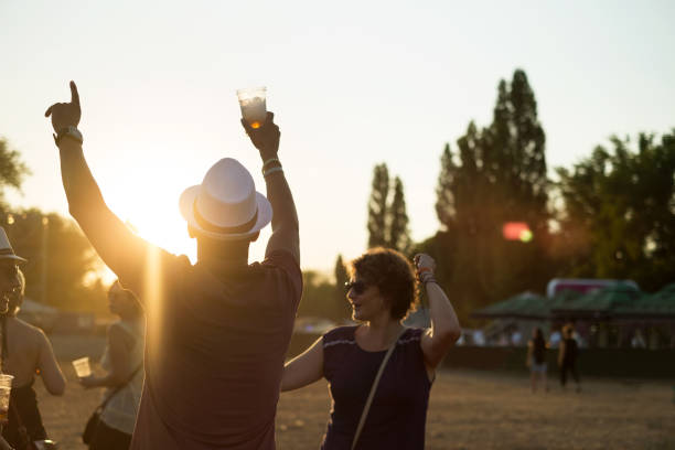 istock Dancing at music festival 854305796