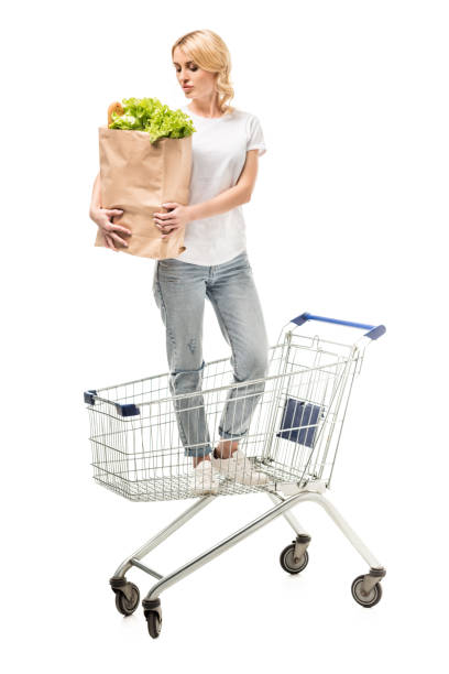 istock woman with paper bag 854309172