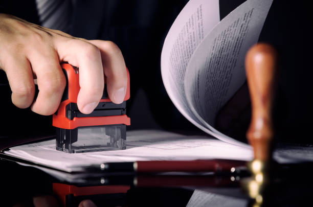 istock Lawyer or attorney working in office with automatic stamp 854317050