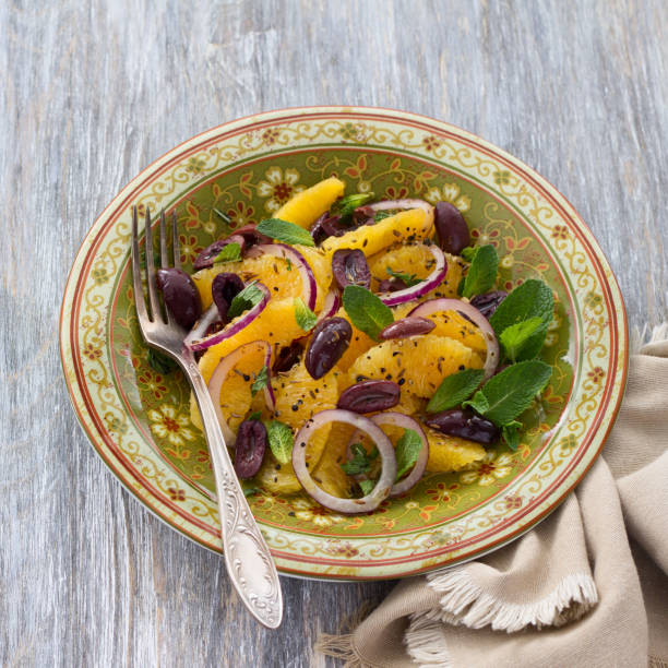istock Plate with moroccan salad from oranges on a wooden table 854321006