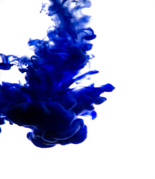 istock blue ink in water isolated on white background 854322354