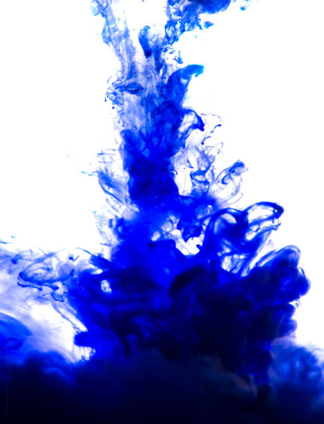 istock blue ink in water isolated on white background 854322412