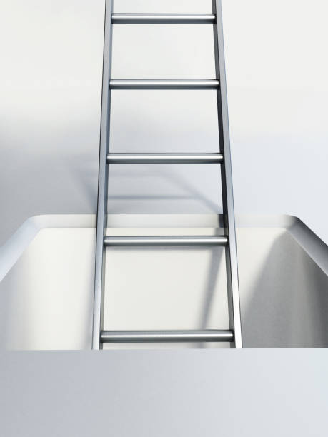 istock Ladder leading to square hole 854324900