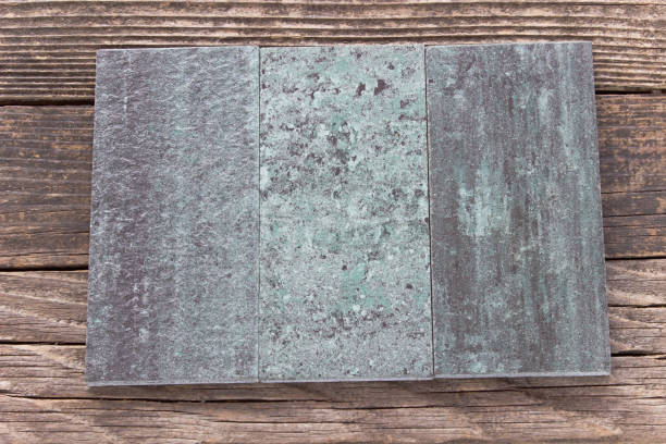 istock Tiles on wooden background 854325442